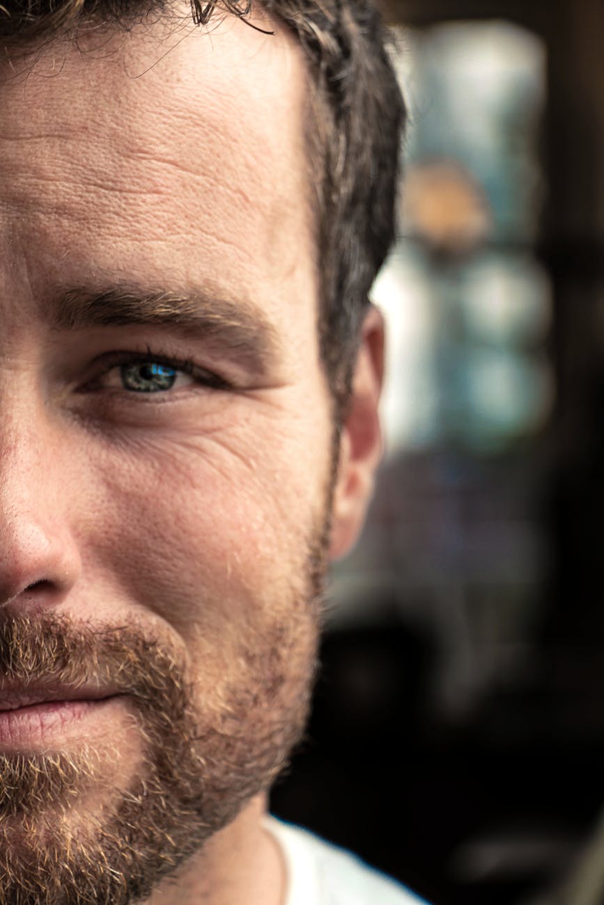 man s half face photo